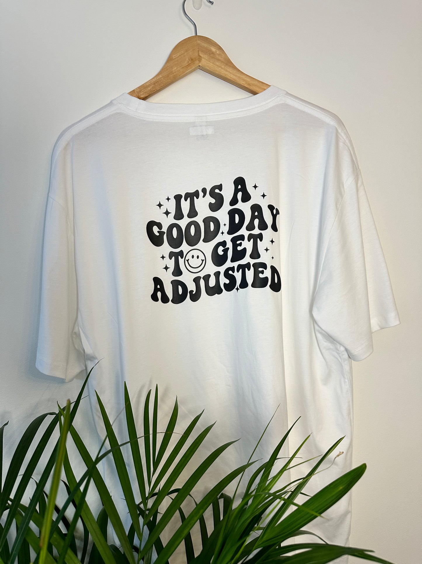 It's a good day to get adjusted unisex T-shirt